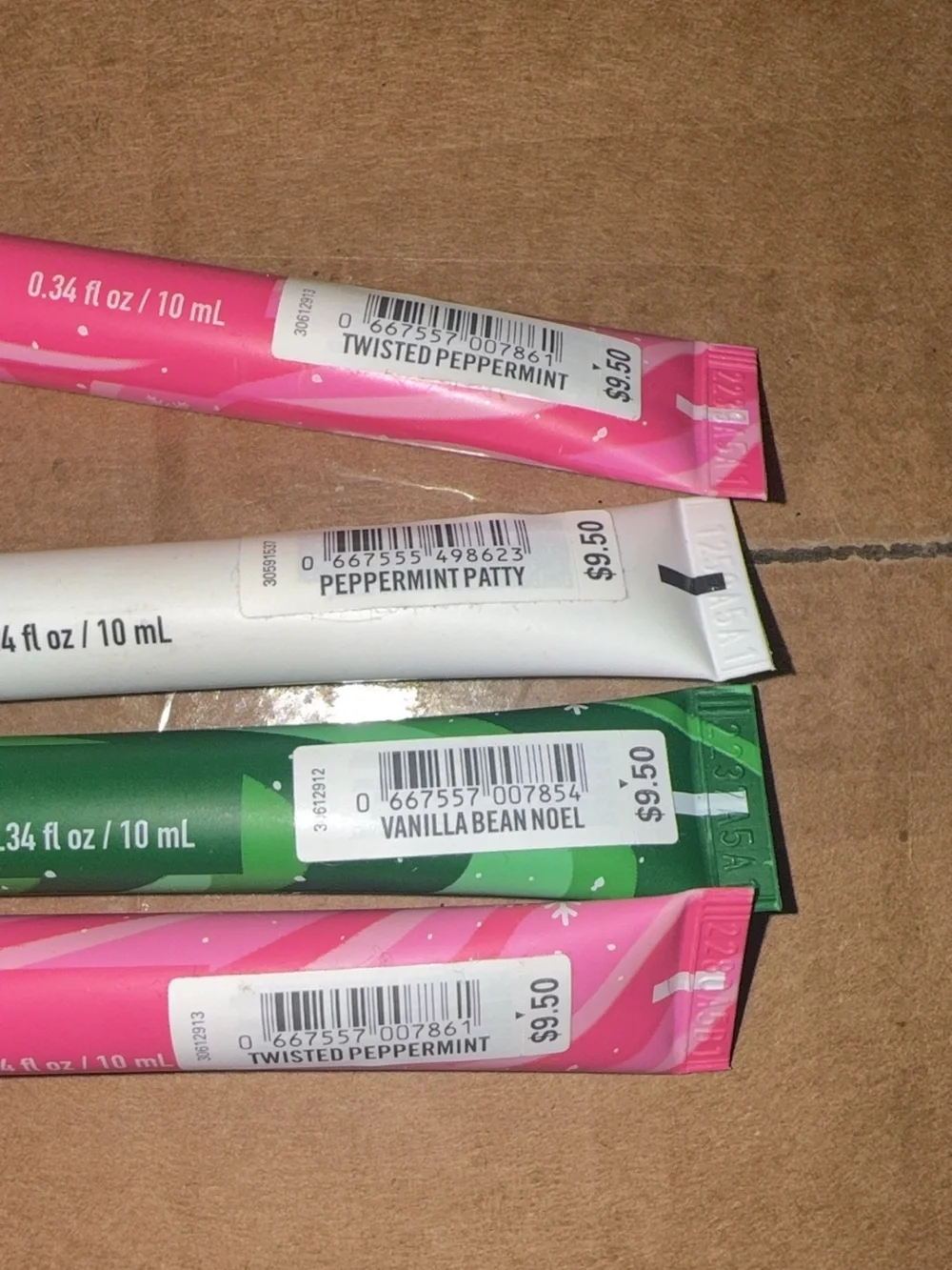 Bath and Body Works Holiday Lip Glosses - Includes 4 - Brand New and Sealed